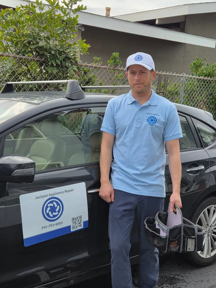 Jackpot Appliance Repair technician with service car and tool bag